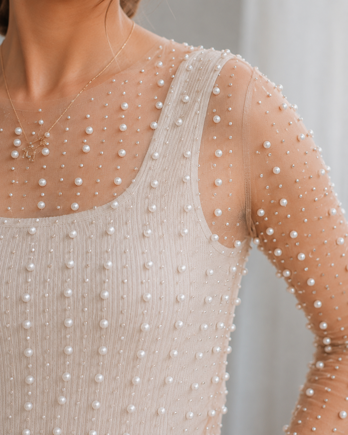 Top de Perlas con Transparencia